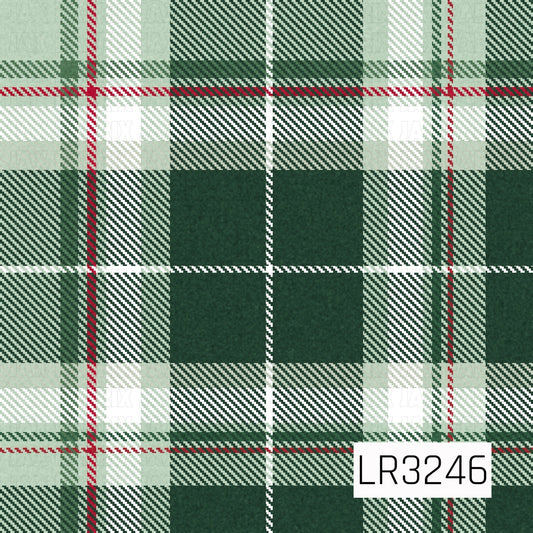 A classic Christmas plaid featuring deep forest green and soft sage tones with crisp white bands and thin red accent stripes. The layered tartan pattern has a subtle textured finish for a cozy, traditional holiday look.
