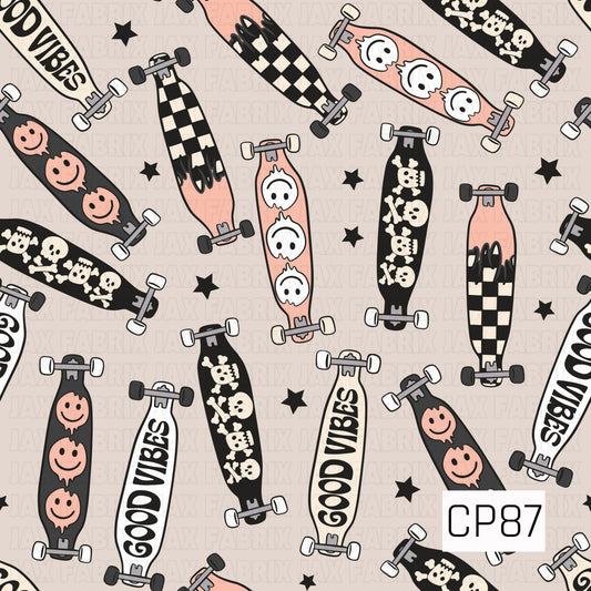 A seamless pattern featuring longboards with checkerboard, smiley face, skull, ghost, and "Good Vibes" designs, scattered with black stars on a soft cream background.
