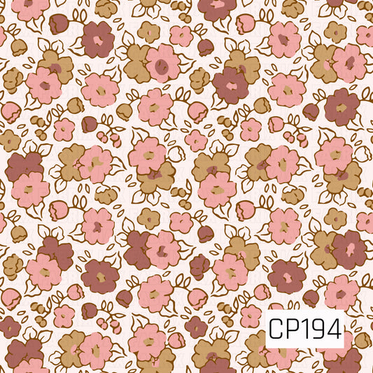 A seamless floral pattern featuring scattered blossoms, buds, and leafy stems in soft shades of blush pink, mauve, camel, and warm brown. Set against a creamy white background, the hand-drawn flowers create a charming vintage-inspired design with a cozy autumn color palette.

