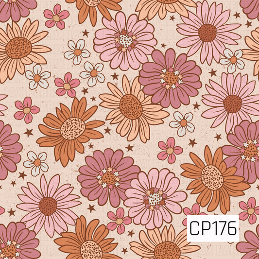 A floral design featuring oversized daisies and wildflowers in shades of blush, mauve, peach, terracotta, and cream, accented with tiny blossoms and scattered stars on a lightly speckled cream background. The warm, earthy color palette gives the design a soft vintage feel.

