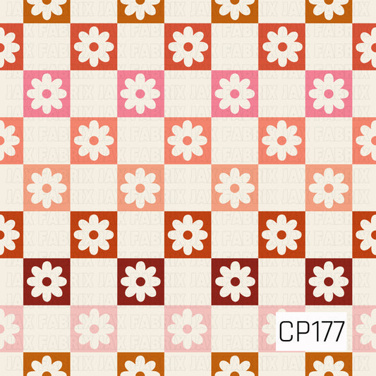 A retro checkerboard design featuring white daisy blooms arranged in alternating cream and colorful squares. Shades of mustard, rust, coral, blush, pink, and deep burgundy create a playful vintage-inspired floral pattern with a warm, cheerful feel.
