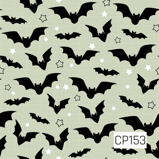 A playful Halloween coordinate featuring black flying bats scattered across a soft sage green background with white stars and outlined sage stars. The simple sage, black, and white color palette creates a fun and whimsical spooky design.

