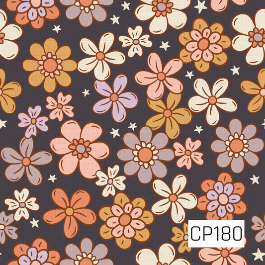 A whimsical floral pattern featuring retro-inspired blooms in warm peach, mustard, cream, blush, and soft lavender scattered across a deep charcoal background with tiny ivory stars. The rich contrast and vintage color palette create a cozy, playful look.