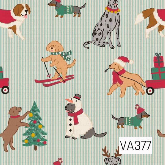 A playful Christmas dog print featuring pups dressed up for all kinds of holiday fun. Dogs are skiing, bundled in cozy sweaters and Santa hats, decorating Christmas trees, pulling wagons full of presents, and even dressed up like snowmen and reindeer. Soft aqua and cream vertical stripes create a vintage-inspired background, while pops of red and green give it a cheerful Christmas feel.
