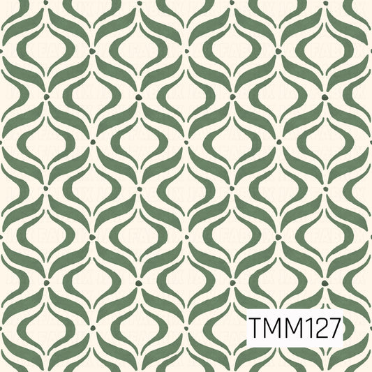 A classic seamless ogee pattern featuring flowing, symmetrical shapes in a rich forest green. The hand-painted watercolor texture adds a soft, organic feel, while the warm ivory background gives the design a timeless, understated look.

