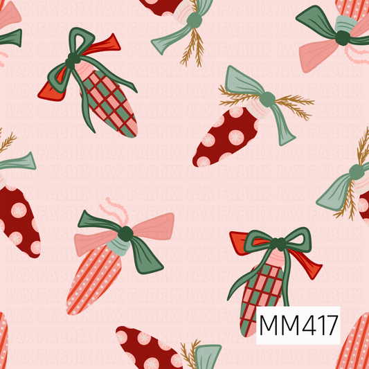 A festive ornament pattern featuring whimsical elongated ornaments tied with oversized bows and decorated with stripes, plaid, polka dots, and delicate details. Soft pink, coral red, sage green, mint, and mustard tones are scattered across a pale blush pink background.
