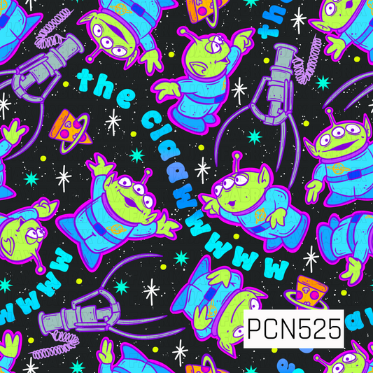 A playful space-themed pattern featuring bright green three-eyed aliens in blue spacesuits floating across a black star-filled galaxy background. The design includes colorful claw machines, planets, stars, and space icons in vibrant shades of neon blue, purple, lime green, yellow, and pink. Fun scattered lettering and cosmic elements create a bold, retro arcade-inspired look with a whimsical outer space vibe.
