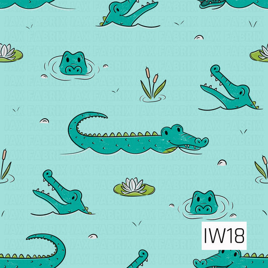 A playful cartoon crocodile pattern featuring adorable teal green crocodiles swimming and peeking out of soft aqua blue water. The crocodiles are illustrated in different poses, with wide-open toothy smiles, curled tails, and curious little faces. Scattered lily pads with white water lilies, cattails, and gentle water ripples add a charming swamp-inspired touch. The textured illustrations and whimsical details give this design a fun, cheerful feel perfect for little ones.