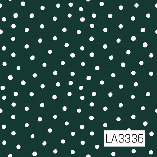 A simple polka dot pattern featuring scattered, hand-painted white dots on a deep forest green background. The slightly imperfect dots give it a playful, hand-drawn feel.
