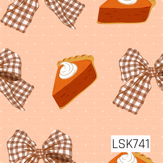 A cozy fall pattern featuring slices of pumpkin pie topped with whipped cream alongside oversized gingham and floral bows. Warm shades of pumpkin orange, cream, and brown are scattered across a soft peach background with tiny cream polka dots.
