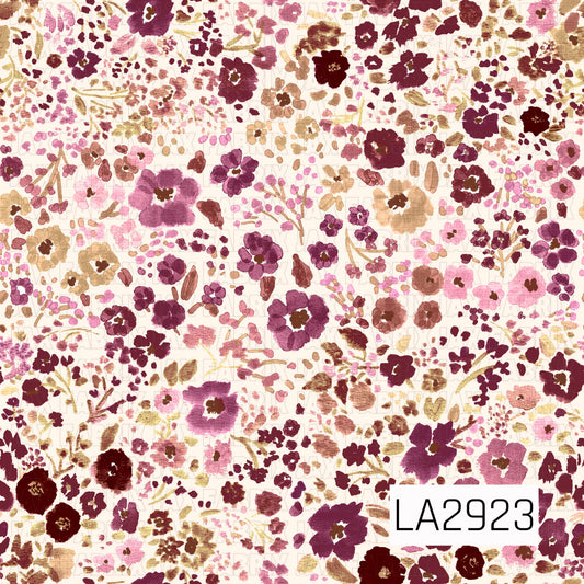 A richly layered watercolor floral pattern featuring abundant blooms and delicate sprigs in shades of berry, burgundy, mauve, blush pink, caramel, and golden tan on a soft cream background. The painterly textures and scattered arrangement create a warm, romantic design with a timeless vintage-inspired feel.
