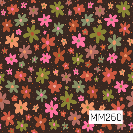 A charming ditsy floral pattern featuring scattered flowers in shades of pink, coral, peach, olive green, and mauve across a rich dark brown background. The playful mix of large and small blooms creates a whimsical, retro-inspired design with warm autumn tones and a cozy, vintage feel.
