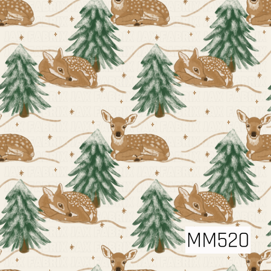 A sweet and whimsical winter woodland pattern featuring adorable baby fawns resting peacefully among tall, snow-covered evergreen trees on a soft, creamy ivory background. The fawns are illustrated in warm caramel brown tones with delicate white spots scattered across their backs, soft cream markings around their faces and ears, and gentle, expressive eyes. Some are curled up with their heads resting on their legs, while others sit upright with their ears perked. The rich forest green pine trees feature sof