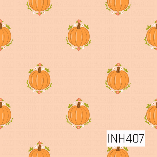 A sweet autumn pattern featuring orange pumpkins framed by tiny coral and white flowers with green leafy sprigs, evenly scattered across a soft peach background.
