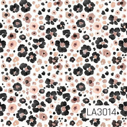 A watercolor floral leopard print with black, blush, peach, and warm brown spots scattered across an off-white background.
