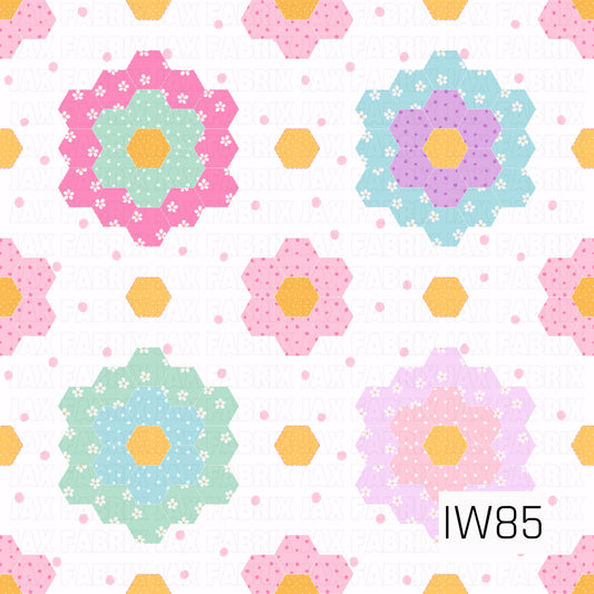 A charming patchwork quilt-inspired pattern featuring colorful floral designs made from tiny hexagon shapes. Shades of pink, mint green, aqua blue, lavender, and yellow create layered geometric flowers, each decorated with delicate miniature blossoms and tiny dotted details. Scattered pink polka dots and golden yellow hexagons fill the white background, giving this design a sweet, vintage-inspired feel.