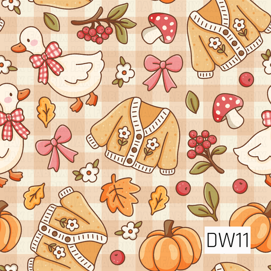 A charming fall pattern featuring adorable white geese with red gingham bows, cozy mustard yellow floral cardigans, orange pumpkins, and red polka dot mushrooms. Pink bows, autumn leaves, berry sprigs, and delicate white flowers are scattered across a soft taupe and cream gingham background for a sweet, cozy autumn look.