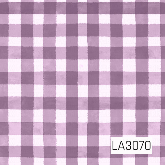 A soft watercolor gingham pattern featuring alternating checks in dusty lavender, muted plum, pale lilac, and creamy white. The slightly uneven, hand-painted edges give the classic plaid design a cozy, charming feel.
