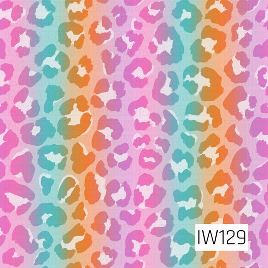 A bright and playful seamless leopard print featuring oversized, irregular spots in vibrant shades of hot pink, turquoise, orange, and purple. The colors blend together in soft, watercolor-like vertical stripes, creating a fun rainbow effect across the design. Each leopard spot features textured, uneven edges and creamy white centers, giving this classic animal print a bold, colorful, and trendy twist.
