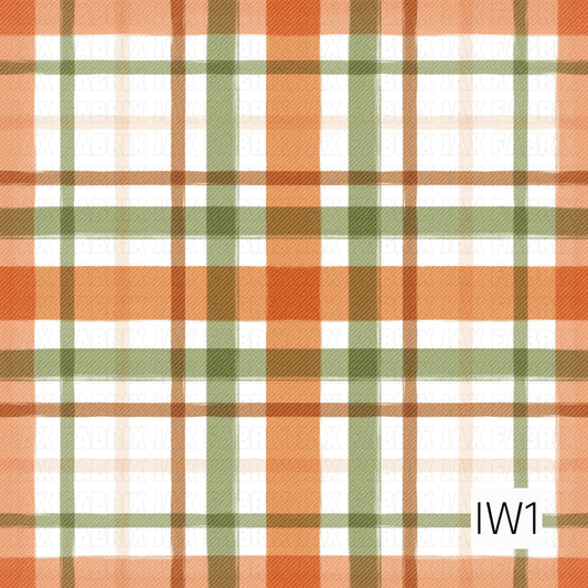 A cozy textured plaid featuring warm orange, olive green, soft cream, and earthy brown stripes on a white background. The woven-style texture gives it a warm, rustic fall feel.
