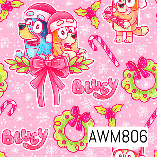 A festive Christmas-themed seamless pattern featuring two playful blue heeler puppies wearing Santa hats, accented with pink bows, lime green wreaths, candy canes, holly, snowflakes, and the word "Bluey" in cheerful pink lettering. Set against a soft pink background with scattered white dots, this bright holiday design combines vibrant pink, lime green, blue, and white for a fun, whimsical look.
