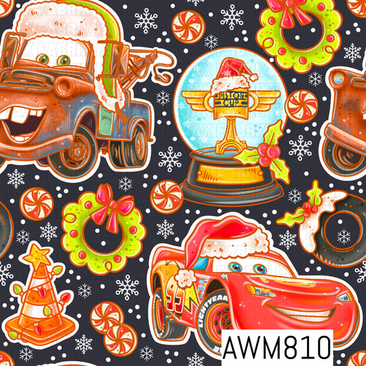 A festive Christmas-themed seamless pattern featuring cheerful cartoon-inspired tow trucks, a red race car in a Santa hat, a holiday racing trophy, lime green wreaths with pink bows, peppermint candies, holly, snowflakes, tires, and a traffic cone Christmas tree. Set against a charcoal gray background with scattered white dots, this playful design combines bright holiday colors with a fun automotive theme.