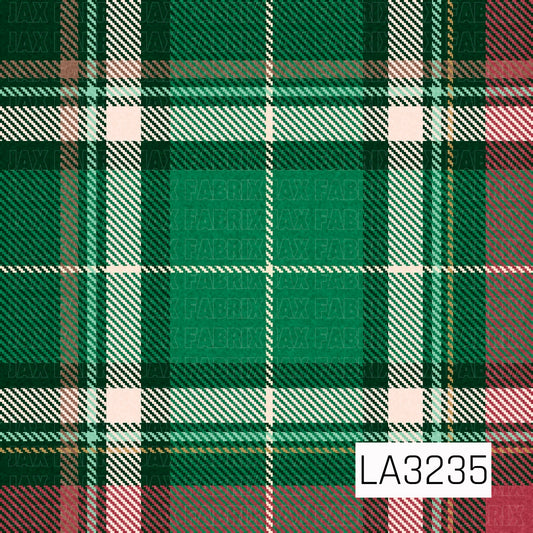 A classic Christmas plaid featuring rich emerald and forest greens layered with cream, red, and subtle gold accents. Bold intersecting stripes and fine diagonal detailing give it a traditional woven tartan look.
