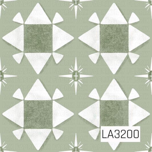 A quilt-inspired geometric pattern featuring oversized white star blocks with muted sage green textured centers on a soft sage background. Smaller four-point starbursts are scattered between the larger shapes, with a distressed, hand-painted finish for a vintage feel.
