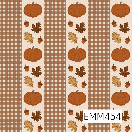 A cozy fall design featuring orange pumpkins, acorns, and autumn leaves arranged between wide warm brown plaid stripes on a soft cream background.
