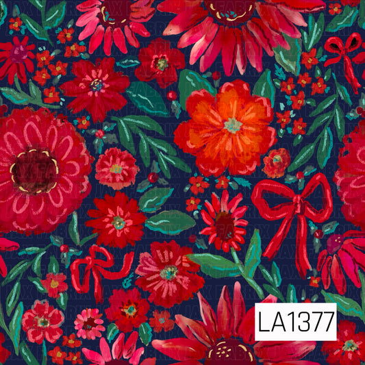 This seamless design features bold painterly florals in vibrant shades of red, coral, and pink against a deep navy blue background. Rich green and teal foliage, scattered mini blossoms, berries, and whimsical red bows create a colorful festive floral pattern.

