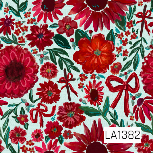 A bold hand-painted floral design featuring vibrant red, burgundy, pink, and orange blooms on a soft mint background. Deep green and teal leafy stems are scattered throughout with tiny coordinating flowers, berries, playful red bows, and crosses accented with bows. Textured brushstrokes and hand-drawn details give the design a whimsical, artistic feel.
