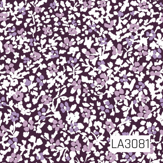 A dense, painterly floral pattern featuring layered white and soft lavender blossoms with leafy sprigs scattered across a rich dark plum background. The closely packed florals create a lacy, textured effect with a romantic vintage feel and striking contrast.
