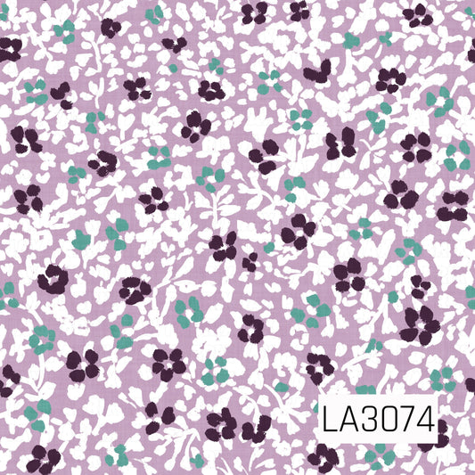A dense floral pattern featuring white leafy vines and blossoms scattered across a dusty lavender background, accented with deep plum and soft teal flowers. The slightly textured, hand-painted style gives the design a layered vintage botanical feel.
