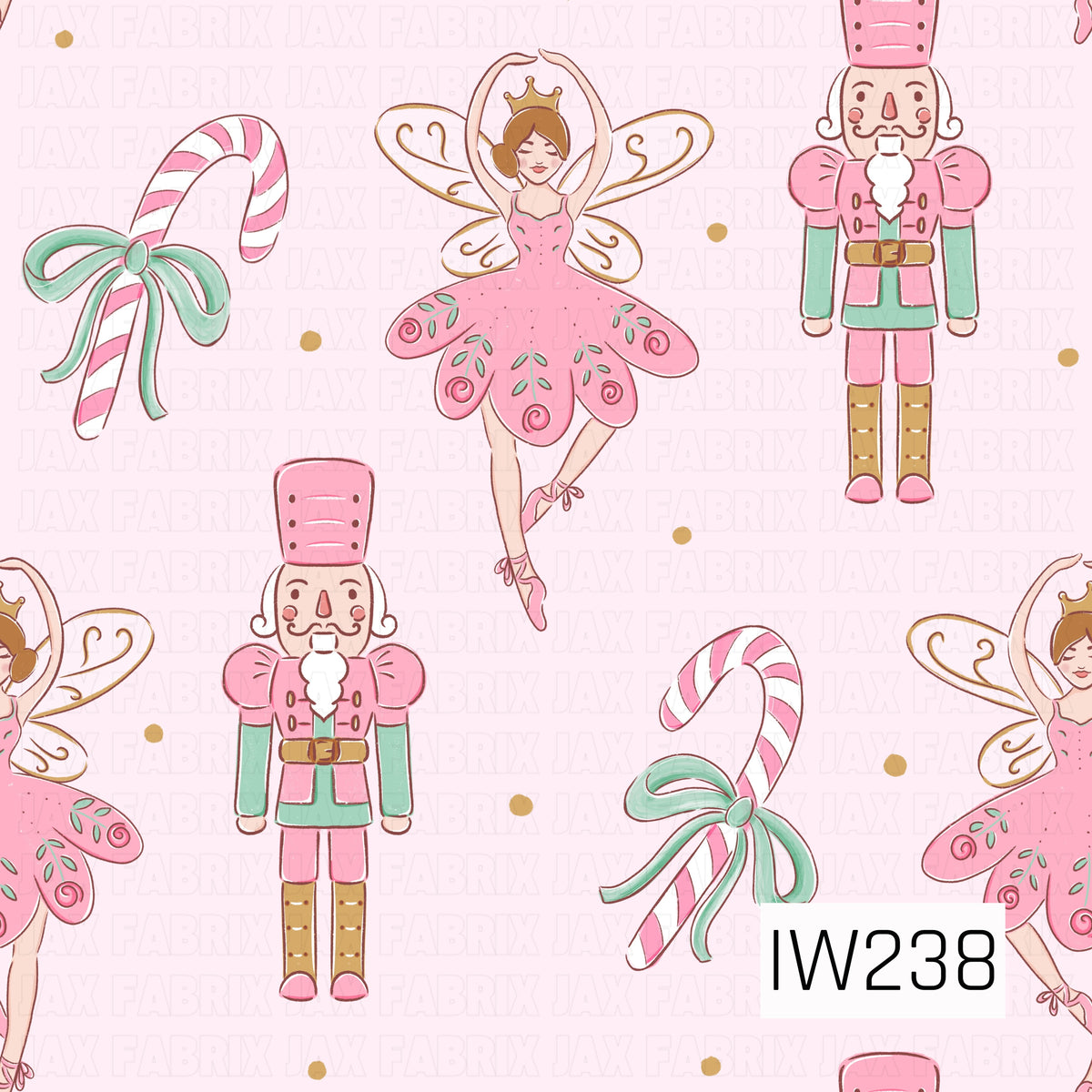 A whimsical Nutcracker-inspired Christmas pattern featuring elegant sugar plum fairies in pink floral tutus with delicate gold-trimmed wings, charming nutcracker soldiers dressed in pink and mint green uniforms, and pink and white striped candy canes adorned with mint green bows. Scattered golden polka dots against a soft blush pink background complete this sweet, magical holiday design.