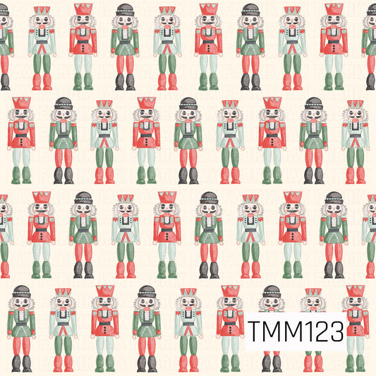 A festive watercolor seamless design featuring rows of classic nutcrackers in bright red, green, mint, black, and white. Set against a warm cream background, the repeating arrangement and hand-painted details create a playful yet traditional Christmas look.
