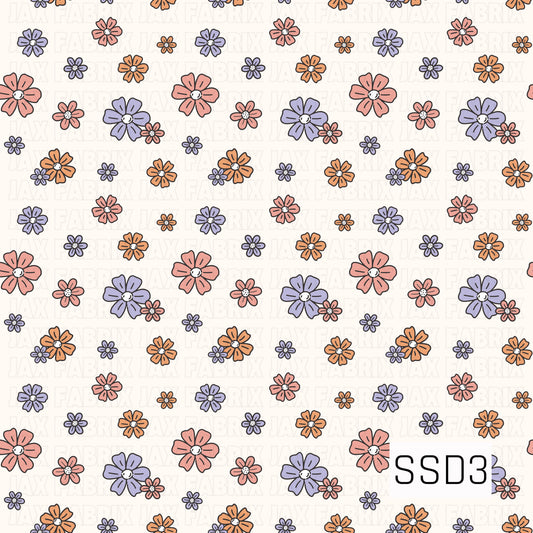 A sweet scattered floral pattern featuring hand-drawn flowers in soft coral pink, lavender, and warm orange on a creamy background. The mix of flower sizes gives it a playful, retro-inspired feel.
