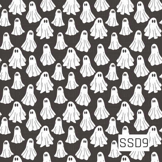 A classic Halloween pattern featuring cute white sheet ghosts scattered across a dark charcoal background.
