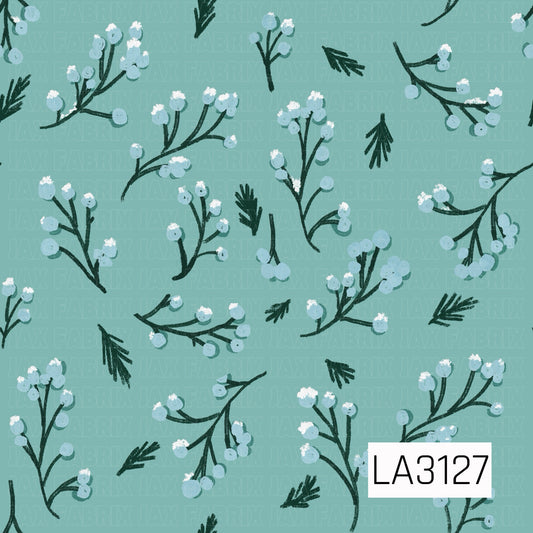 A winter botanical pattern featuring dark evergreen branches with icy blue berries topped with touches of white snow. Scattered pine sprigs add to the wintry look, all set against a soft muted aqua background with a hand-drawn, textured finish.
