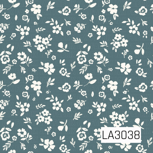A delicate vintage floral featuring creamy blossoms and leafy sprigs scattered across a muted dusty blue background. The hand-painted texture and soft two-tone palette give it a charming, timeless cottage feel.
