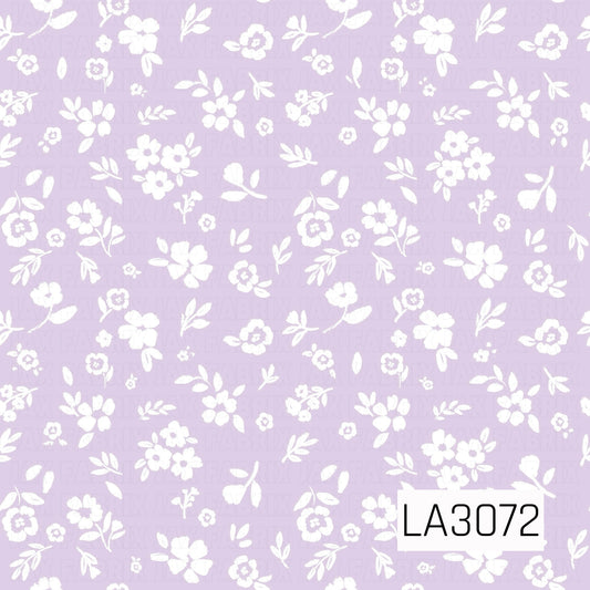 A delicate floral pattern featuring scattered white wildflowers, leafy sprigs, and petite blossoms across a soft light lavender background. The hand-painted, slightly textured details give the design a sweet, vintage-inspired cottage feel.
