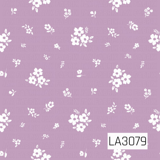 A delicate scattered floral pattern featuring white blossoms, petite flower clusters, and leafy sprigs on a soft dusty mauve-purple background. The airy spacing and lightly hand-painted texture create a sweet, vintage cottage-inspired look.
