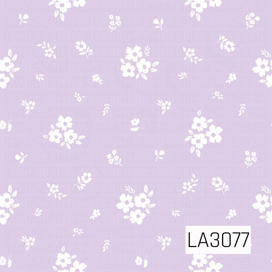 A delicate scattered floral pattern featuring petite white blossoms, small flower clusters, and leafy sprigs across a soft light lavender background. The airy spacing and hand-painted details give the design a sweet, understated vintage cottage feel.
