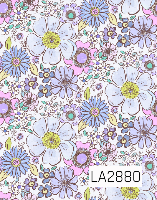 A charming floral pattern featuring oversized soft lavender blooms, dusty blue daisies, delicate pink flowers, and tiny white blossoms accented with sage green leaves. Set against a pale lavender background, the blend of lavender, blue, pink, green, and cream tones creates a sweet vintage-inspired design that's perfect for coordinating fabrics and bows.
