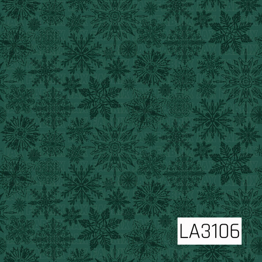 A moody tonal winter pattern featuring an assortment of intricate, hand-drawn snowflakes in deep forest green layered over a muted evergreen background. The varying snowflake shapes and sizes create a rich, subtle winter look.
