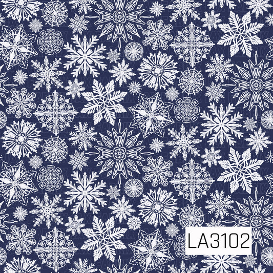 A classic winter snowflake pattern featuring an assortment of intricate, hand-drawn snowflakes in crisp white against a deep navy blue background. The mix of detailed shapes and varying sizes creates a layered, snowy winter look.
