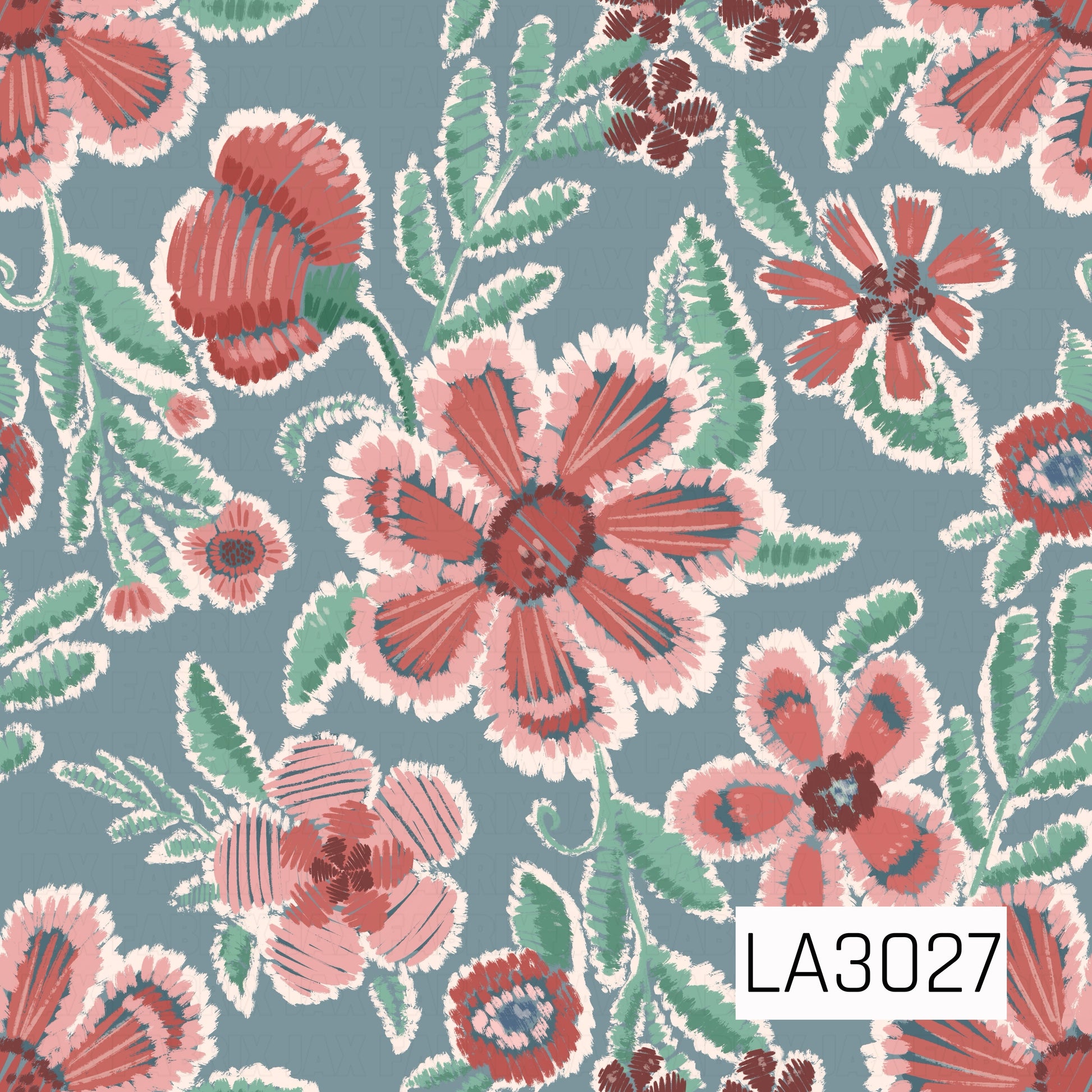 A bold embroidered-style floral print featuring coral and blush blooms with minty green foliage on a dusty blue background. Creamy stitched accents and textured brushwork give the design a charming handmade, vintage-inspired feel.
