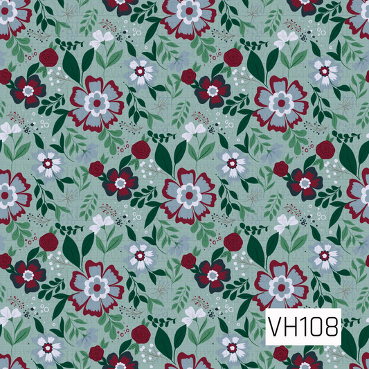 A beautiful vintage-inspired floral pattern featuring large layered blooms in deep burgundy, dusty blue, soft ivory, and charcoal against a muted sage green background with a subtle woven texture. Smaller burgundy roses, delicate white flowers, leafy green branches, and tiny berry accents fill the spaces between the larger blossoms. The rich jewel tones, soft blue accents, and lush greenery create an elegant, romantic botanical design with a cozy, timeless feel.