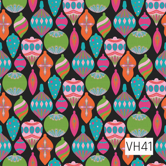 A bold holiday design featuring colorful vintage ornaments in bright pink, teal, green, and orange on a black background.
