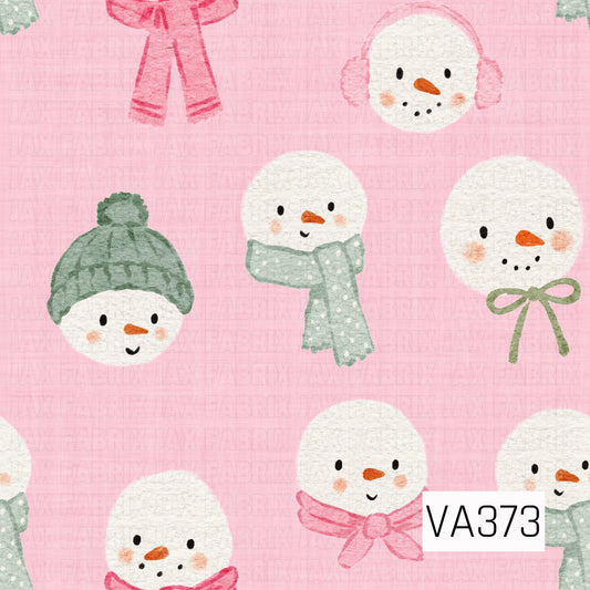 A sweet watercolor Christmas pattern featuring cheerful snowmen on a soft pink textured background. The snowmen are dressed in cozy dusty sage and pink accessories, including knit hats, scarves, earmuffs, and dainty bows, with rosy cheeks and classic carrot noses.
