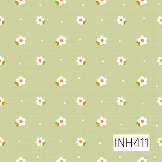 A cheerful floral toss featuring petite white blossoms with coral centers, olive-green leaves, and tiny cream dots scattered across a soft sage-green background.
